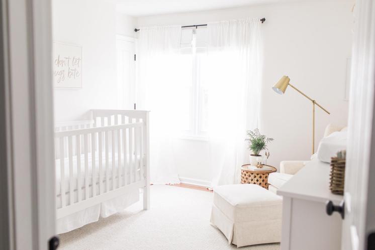 bright white airy nursery with open windows