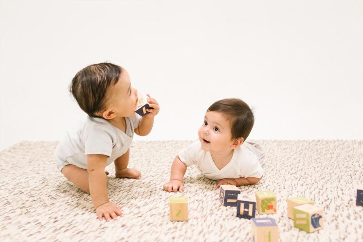 babies playing with blocks at daycare