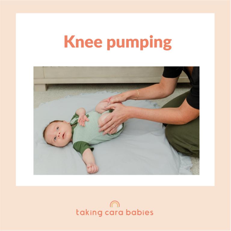 newborn lying on back with adult gently holding calves and pushing legs to bend at knees and up towards belly