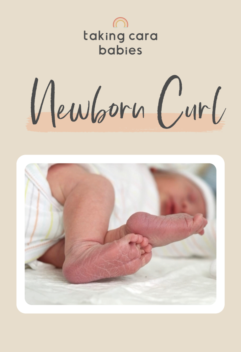 newborn curling onto side, view from below the feet